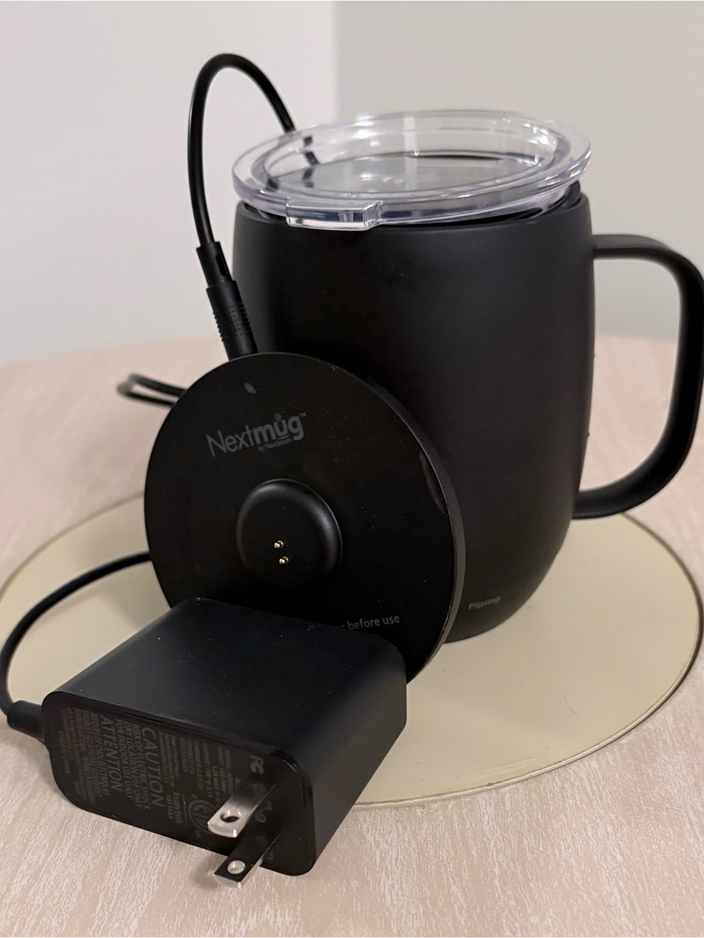 Nextmug Black Coffee Mug w warming base and clear lid.